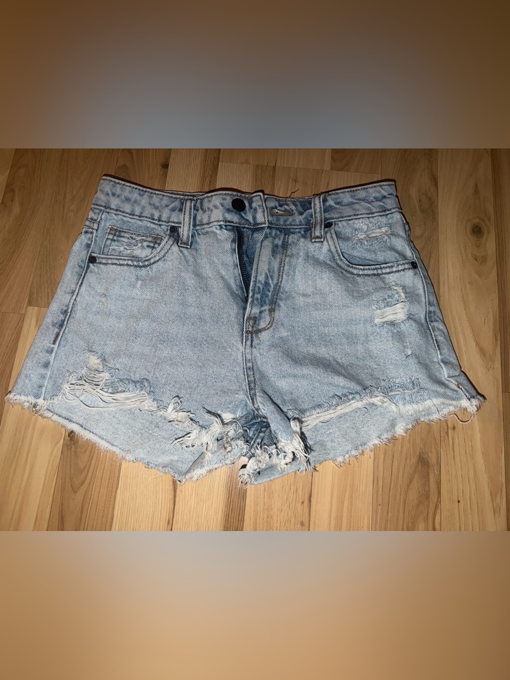 High-Rise Light Blue Distressed Denim Cutoff Shorts